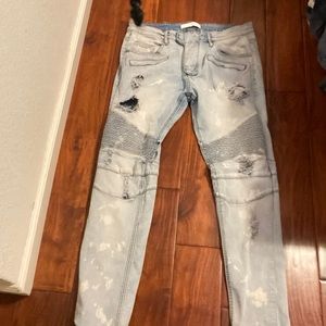 Light blue ripped jeans